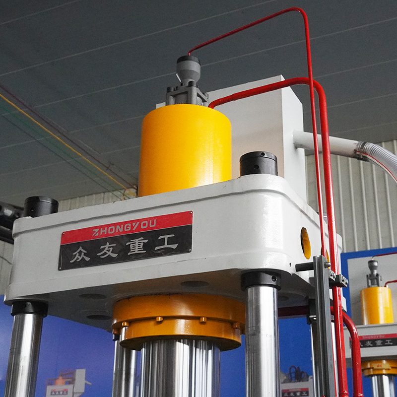 Hydraulic press for forming automotive air conditioning compressor components   